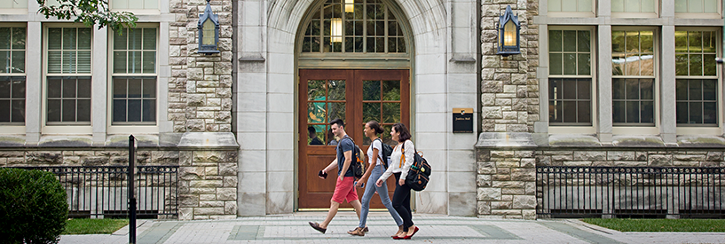 students walking outside the campus