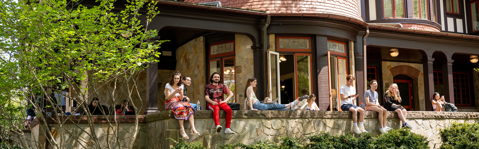 students sitting outside