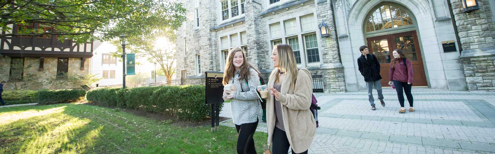 students walking outside the campus